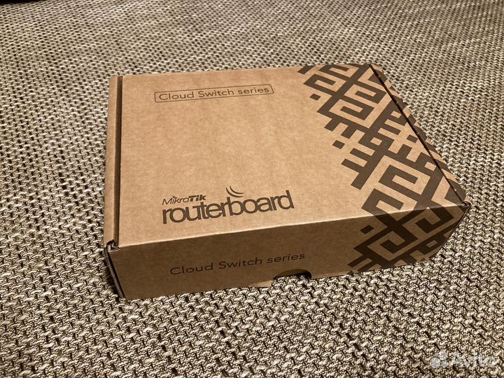 Коммутатор Mikrotik CRS106-1C-5S