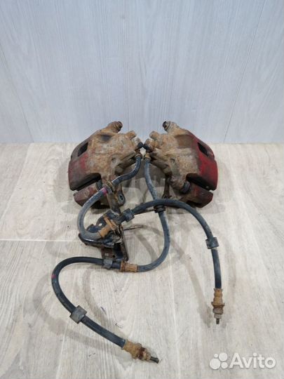 Суппорт передний левый Mitsubishi Lancer 10