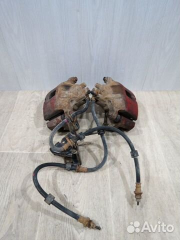 Суппорт передний левый Mitsubishi Lancer 10