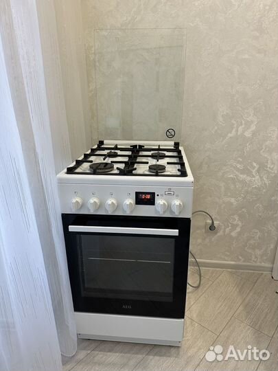 Газовая плита с электрической духовкой AEG