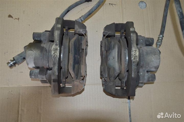 Суппорт передний правый Mazda Demio (dy5w) 2002-2