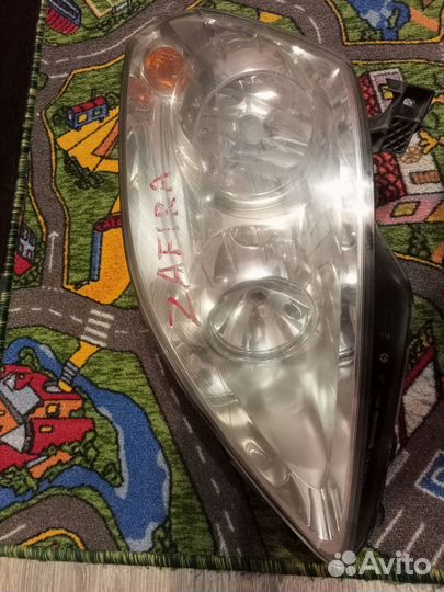 Фара передняя левая Опель Зафира Б рест