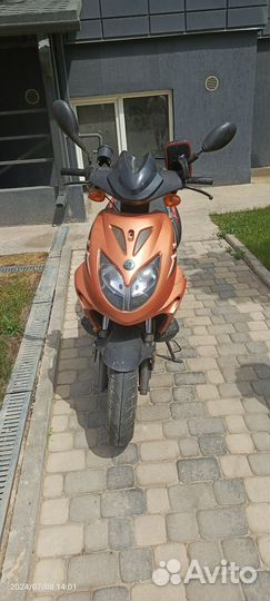 Скутер омакс