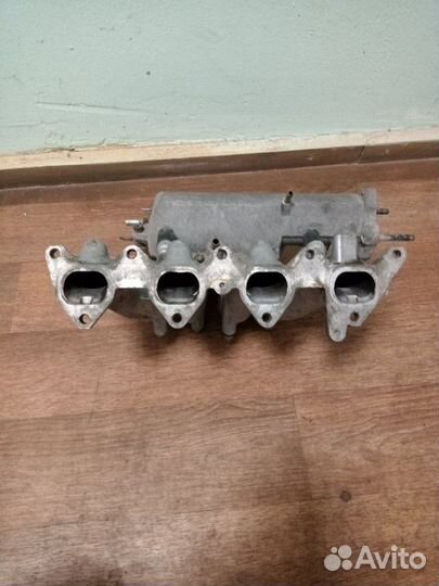 Коллектор впускной Toyota Carina E лифтбэк (T191)