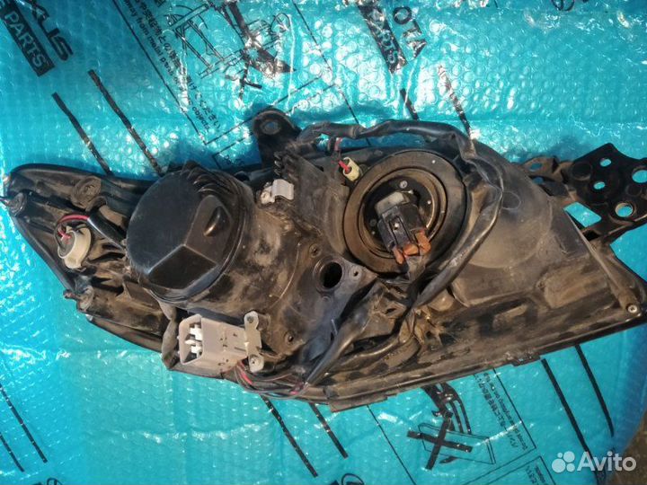 Фара галогеновая левая Subaru Impreza GE 2007