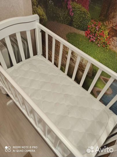 Детская кроватка с поперечным маятником