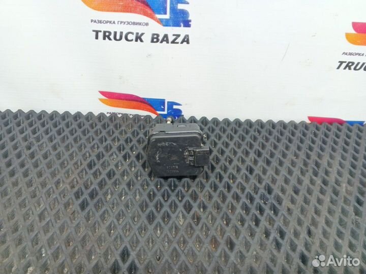 Моторчик корректора фары левый