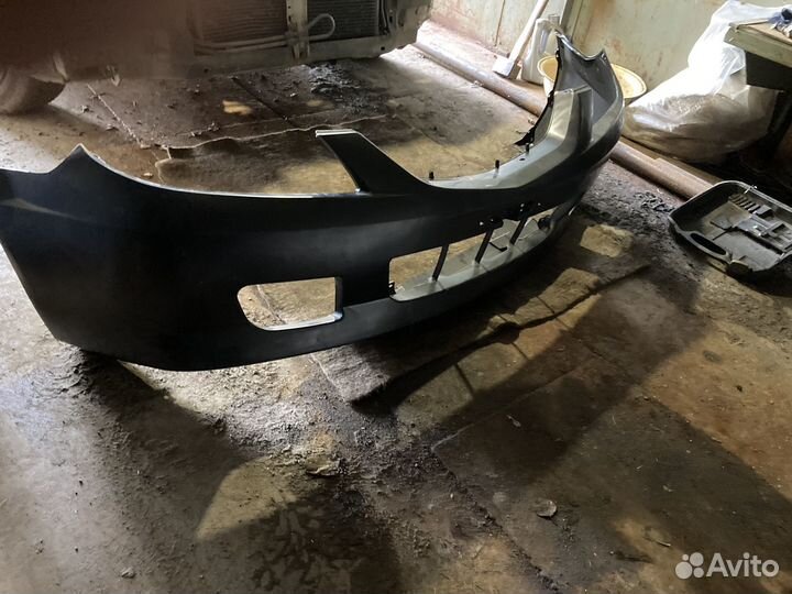 Бампер передний mazda familia2001 год