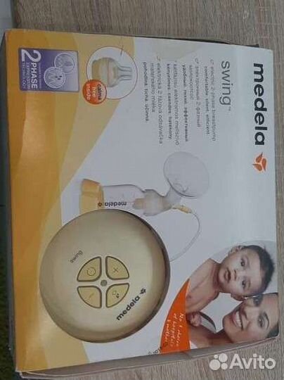 Молокоотсос medela swing