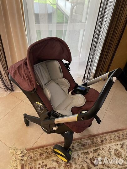 Коляска автокресло doona с базой isofix