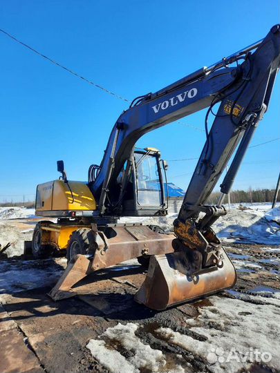 Колёсный экскаватор Volvo EW140, 2000