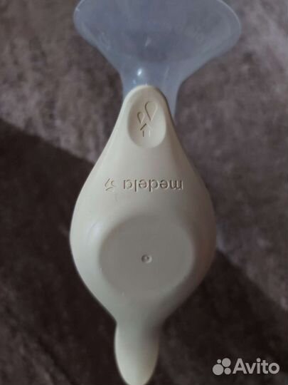 Молокоотсос medela