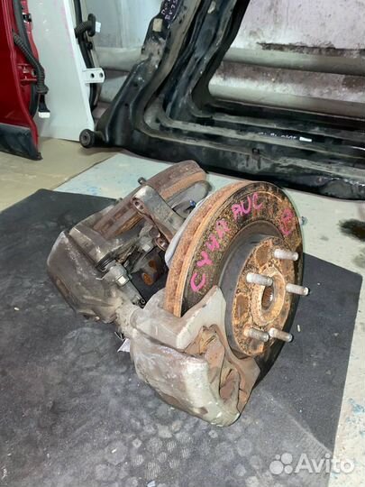 Поворотный кулак Mitsubishi lancer 10 в сборе