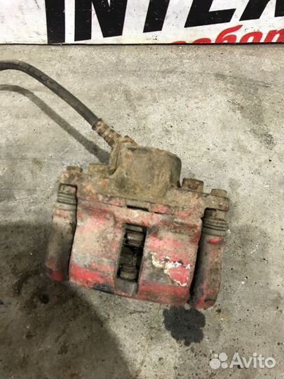 Суппорт тормозной передний правый Renault Logan