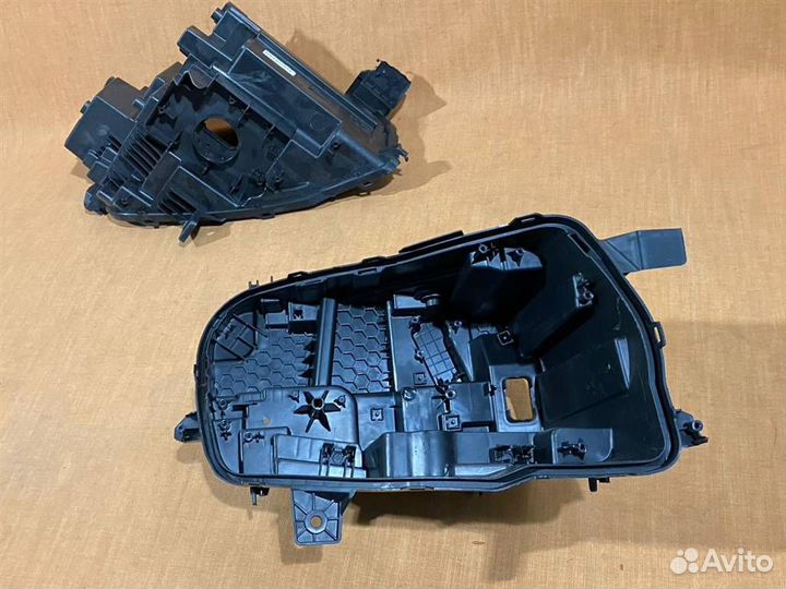 Корпус фары правый Geely Tugella