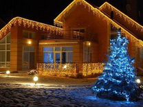 Новогоднее украшение освещение дома, здания
