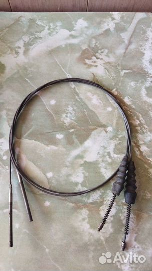 Трос ручного тормоза новый