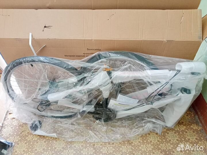 Новый велосипед в упаковке