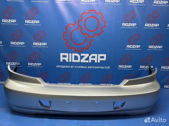 Бампер задний Kia Spectra