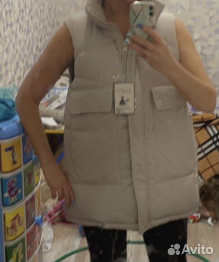 Жилет новый
