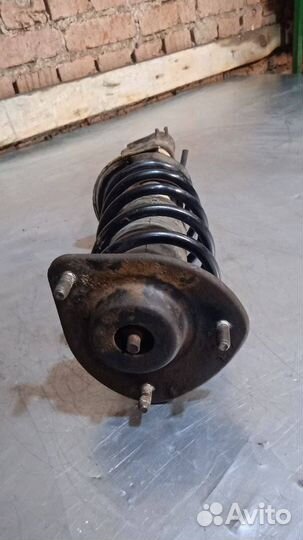 Стойка амортизатора передняя правая Smart Forfour