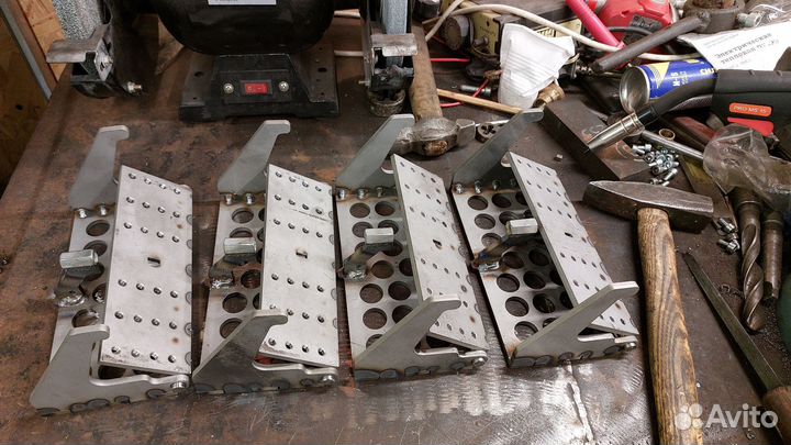 Приспособление для выведения спусков