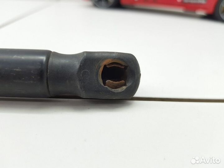 Амортизатор багажника левый (Mazda 3)