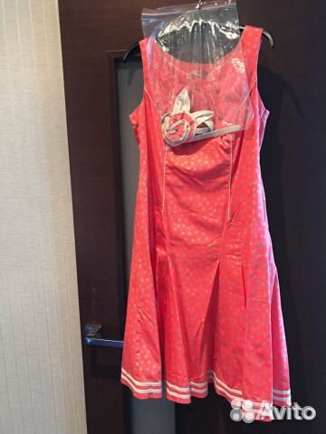 Фирменное новое платье,очень стройнит