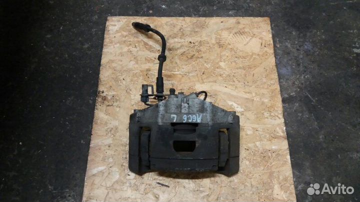 Суппорт тормозной передний левый Audi Alroad A6 C6