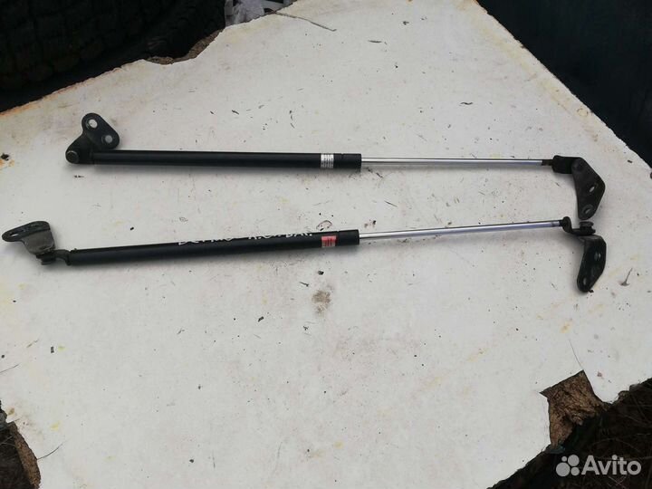 Амортизатор крышки багажника Мазда Демиo 1