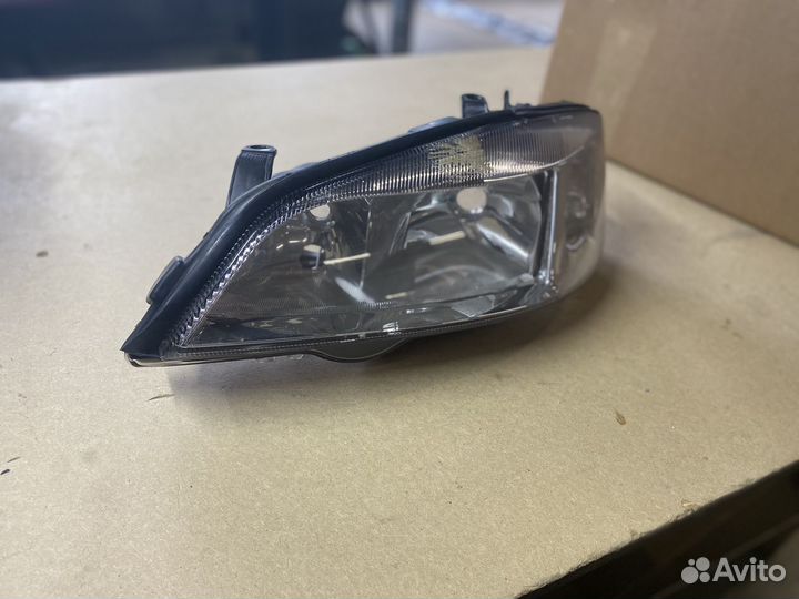 Фара передняя левая opel astra g