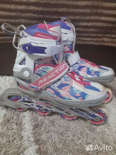 Роликовые коньки