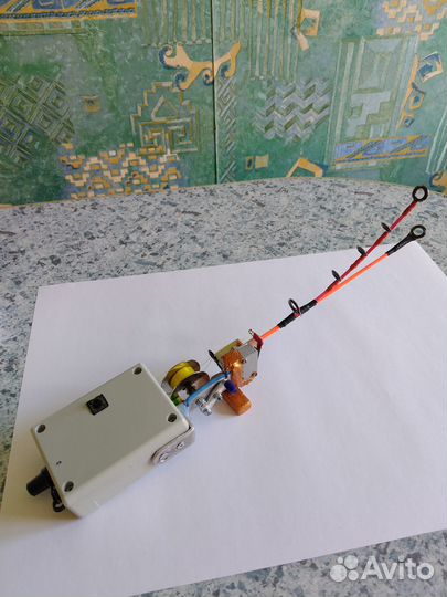 Удочка с электроприводом катушки