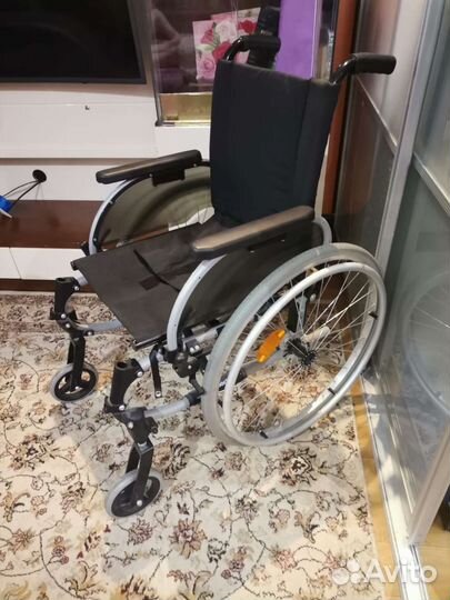 Инвалидная коляска новая
