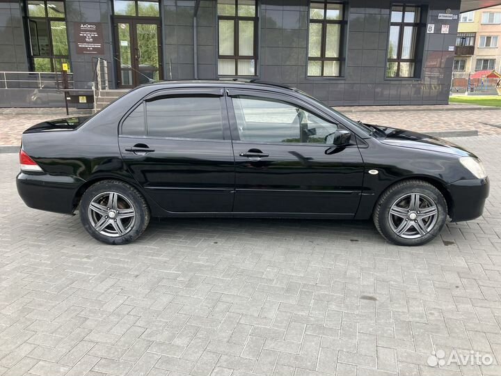 Mitsubishi Lancer 1.6 МТ, 2005, 180 000 км