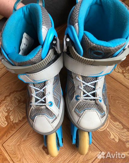 Роликовые коньки