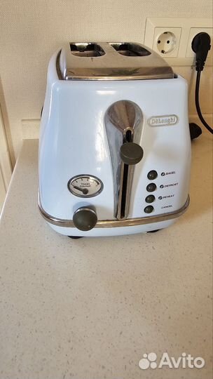 Тостер delonghi