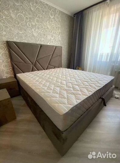 Кровать с подъемным механизмом