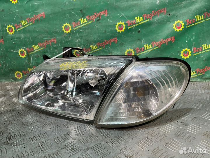 Фара передняя левая Nissan Almera N16