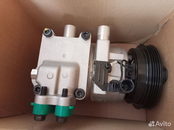 Компрессор кондиционера tucson