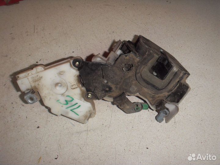 Замок двери задней левой 8255361U01 Nissan Pulsar