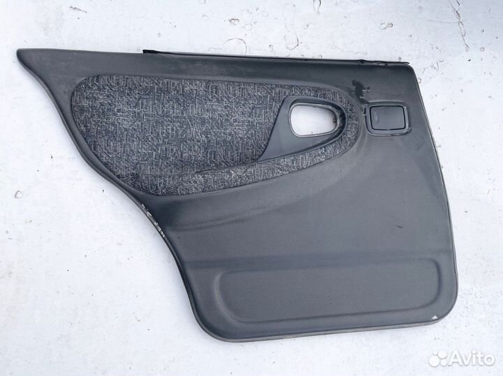 Обшивка двери задняя левая Daewoo Nexia