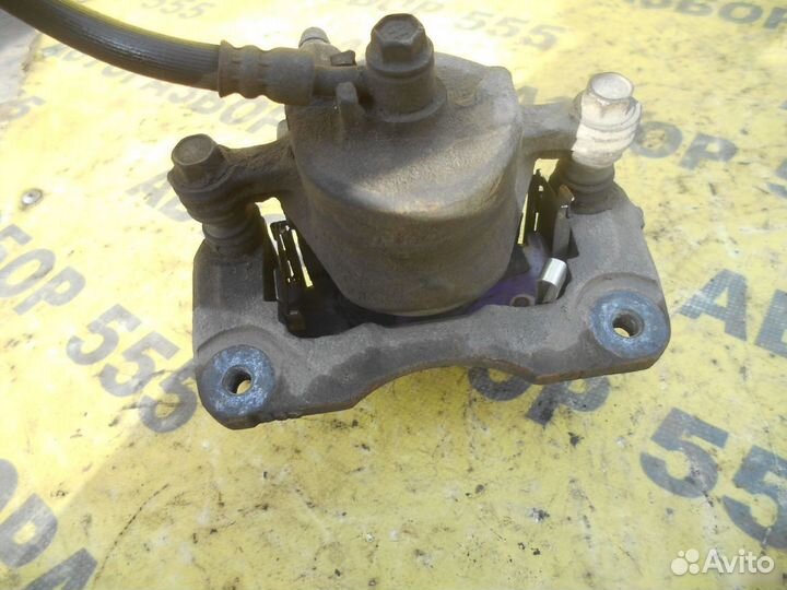 Суппорт передний левый Nissan Pulsar 1995-2000