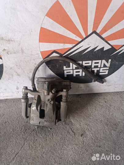 Суппорт задний правый Mazda CX-5