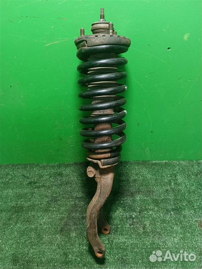 Стойка амортизатора передняя левая Ssangyong Rext