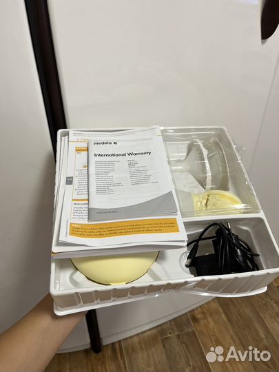 Молокоотсос medela электрический