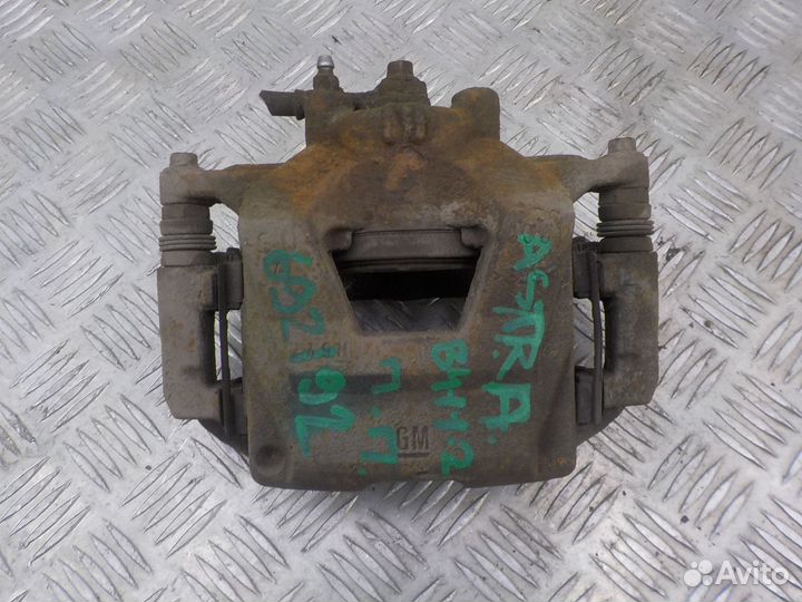 Суппорт тормозной передний правый Opel Astra J 201