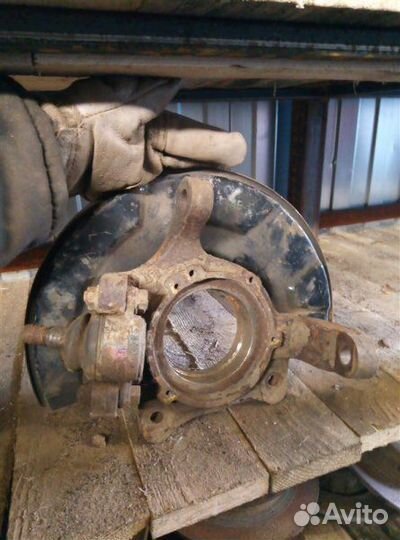 Кулак (цапфа) передний левый Ssang Yong Kyron 2013