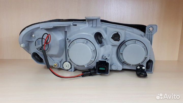 Фара передняя левая Kia Spectra SD