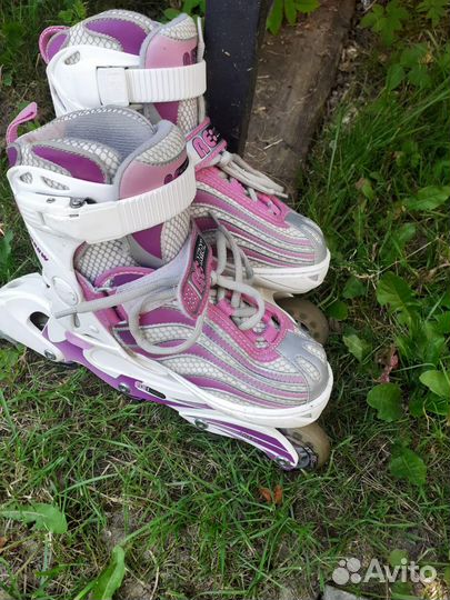 Роликовые коньки